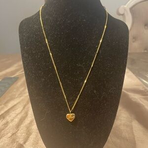 Gold Heart Pendant Necklace engraved with “Love” in Cursive